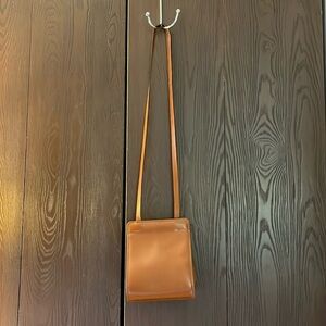 Cristian vintage tan genuine Italian leather crossover handbag. 7by9